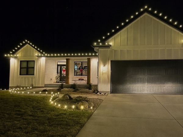 a home that was decorated with christmas lights in Delaware by 302 Christmas Lights
