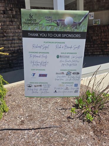 Sponsor board for LGMD2D Foundation golf event with various sponsor categories.
