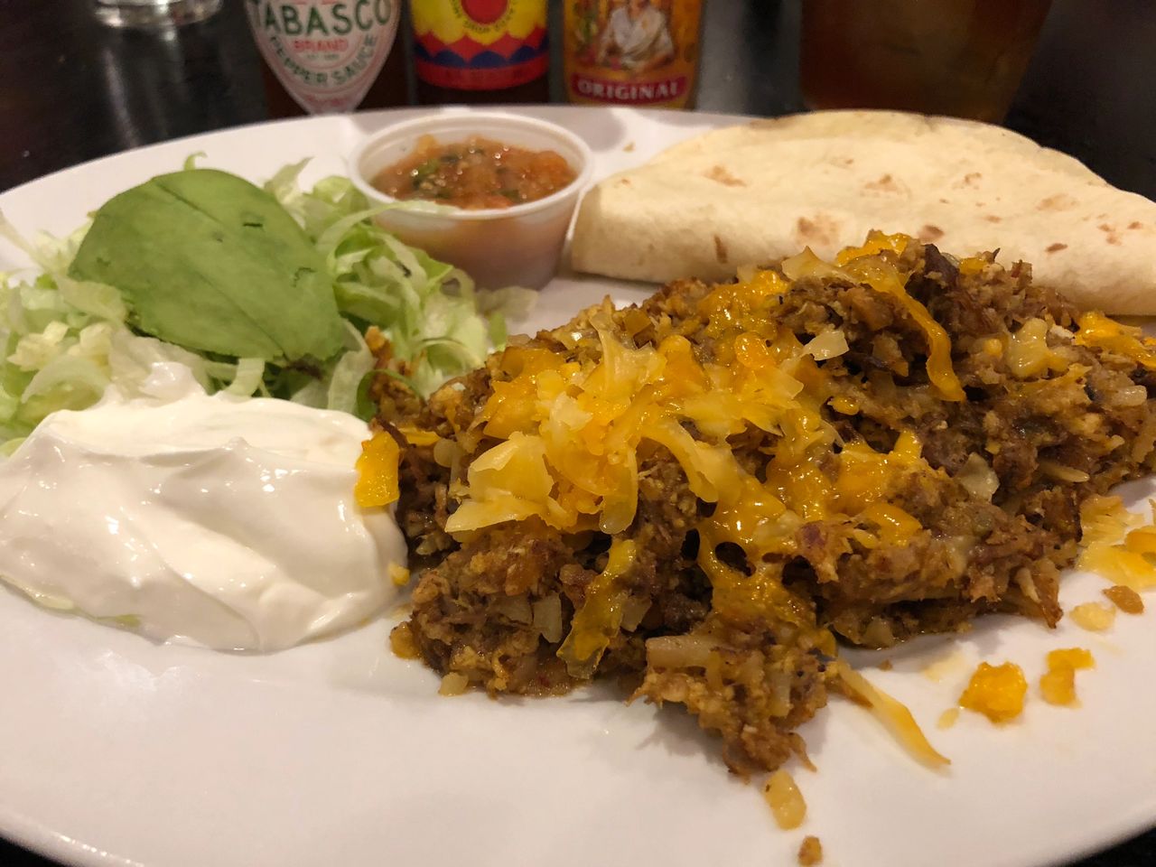 spicy pork tinga breakfast tacos at Ellen's in Dallas spicy pork tinga breakfast tacos at Ellen's in Dallas