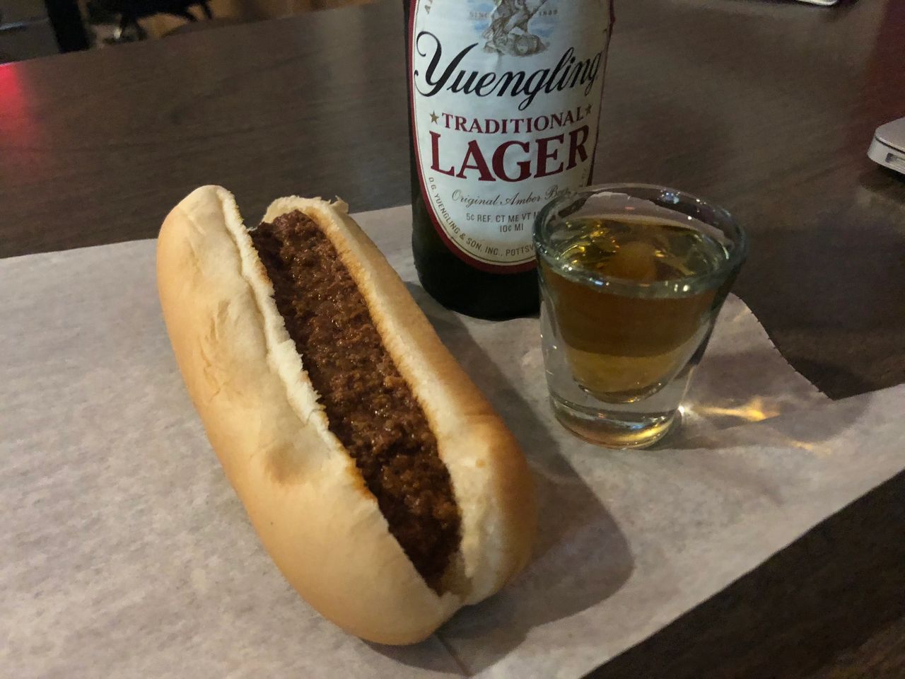 Bottle of Yuengling, shot of Jack and hot dog "with sauce" at Wakim's, America's greatest dive bar. 