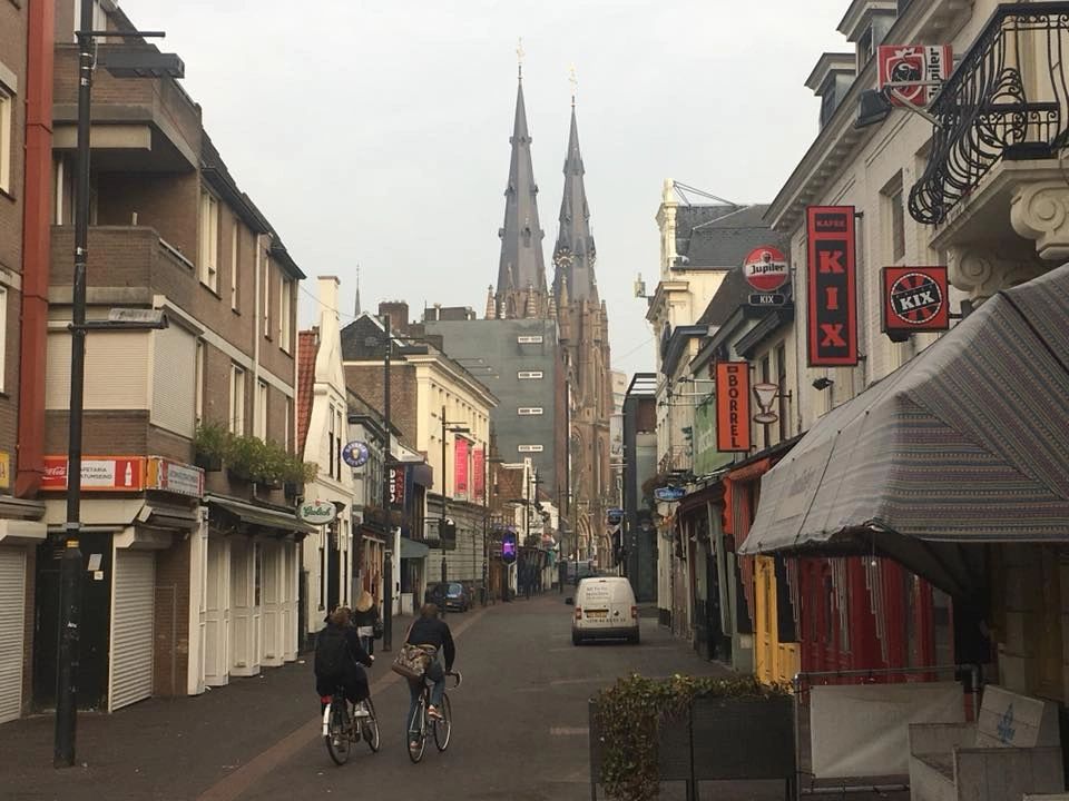 Downtown Eindhoven today, with the signature twin spires of St. Catherine's Cathedral in the background. 