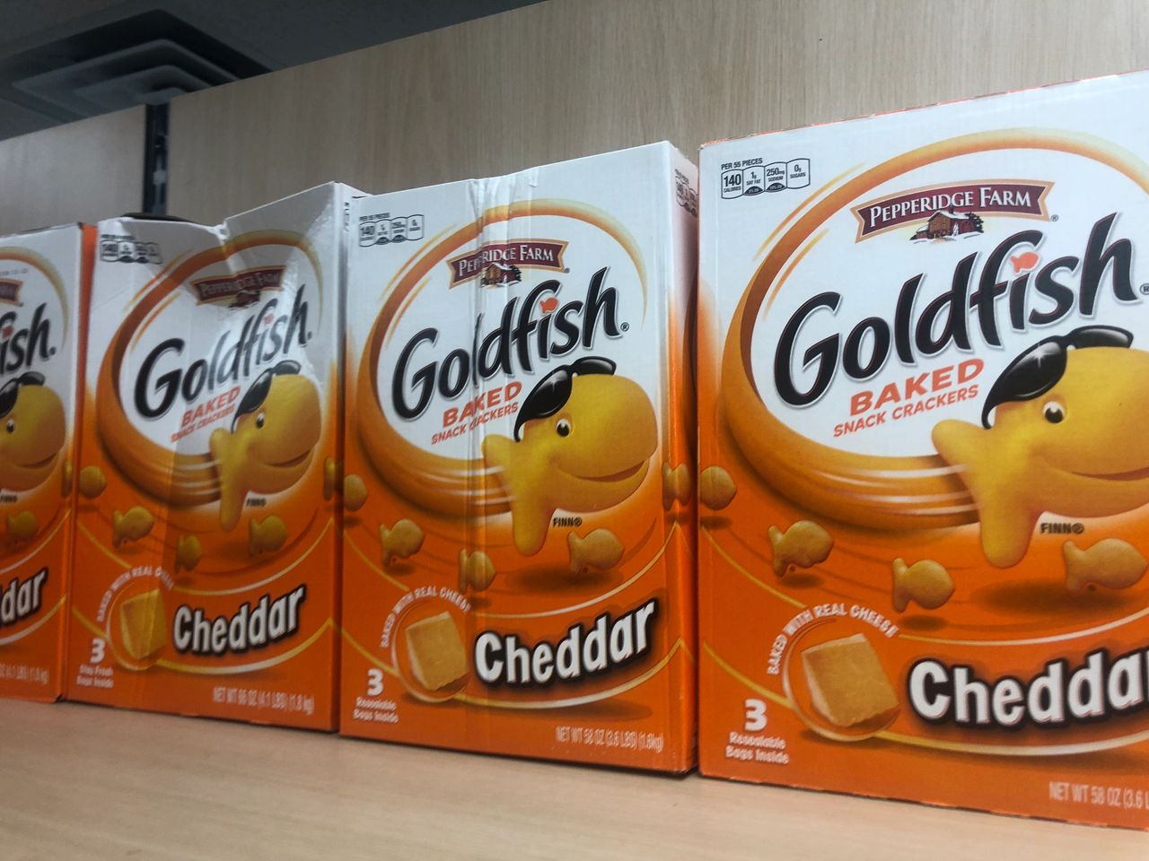 Giant 58-ounce boxes of Pepperidge Farm Goldfish, may in various states of disrepair.