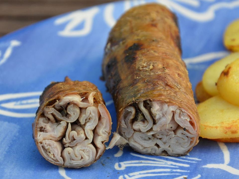 A delicious look at the folded intestines inside the original andouille of Vire, France. 