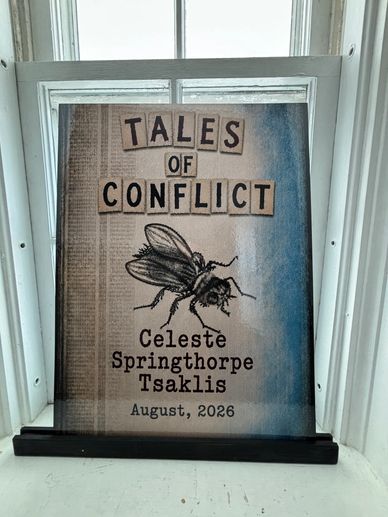 Book cover titled 'Tales of Conflict' by Celeste Springthorpe Tsaklis.