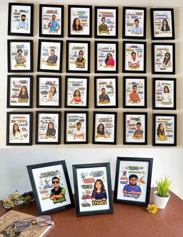 Framed caricature portraits with personalized messages arranged on a wall and table.