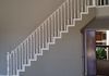 Before: Dated wood spindel staircase