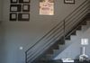 After: Sleek custom contemporary metal staircase railing