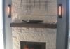 After: Floor-to-ceiling stone fireplace with hearth and mantel