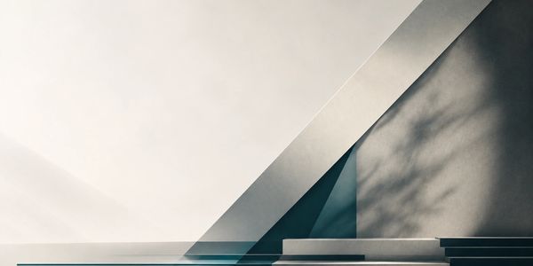 Minimalist architectural interior with sharp shadows and geometric lines.