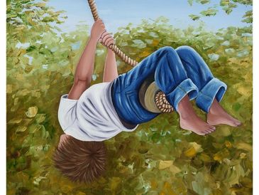 Free Spirit. Young boy on a swing.