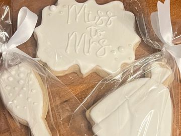 Our wedding collection of freshly baked sugar cookies,decorated in your favorite colors. 
