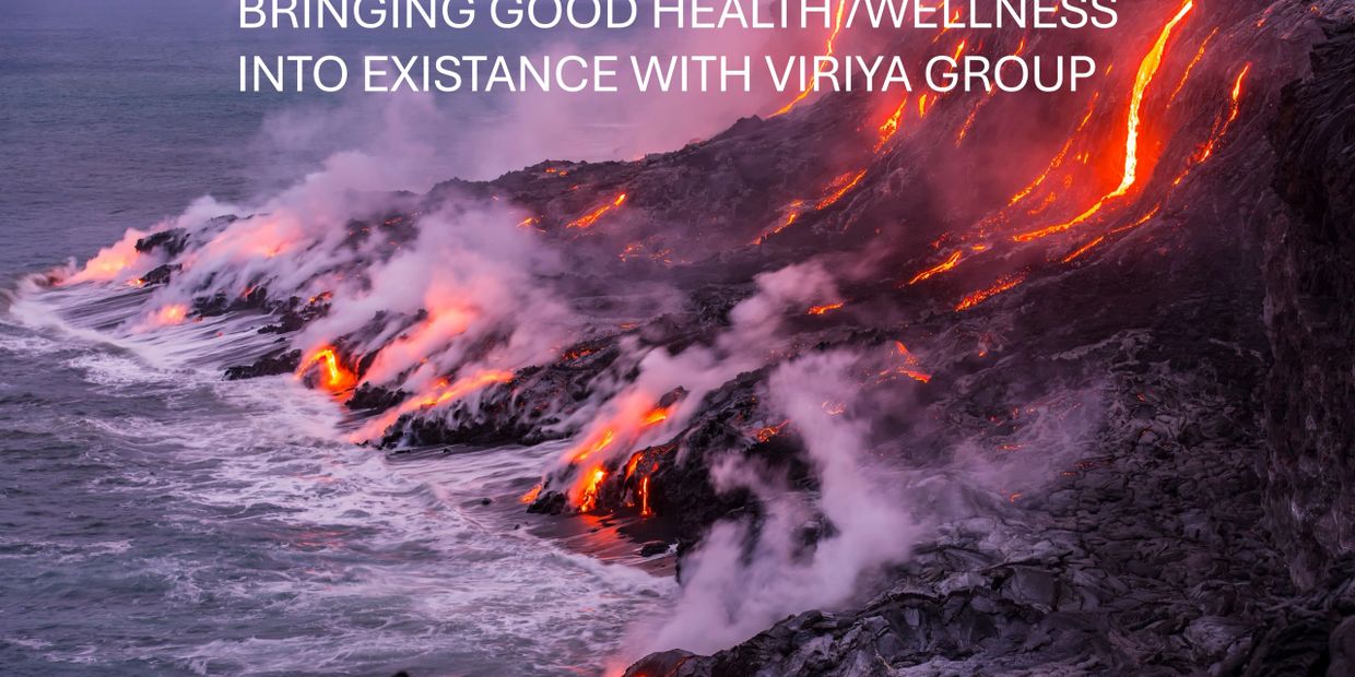 Lava flows into the ocean, creating steam and glowing red-hot rock.