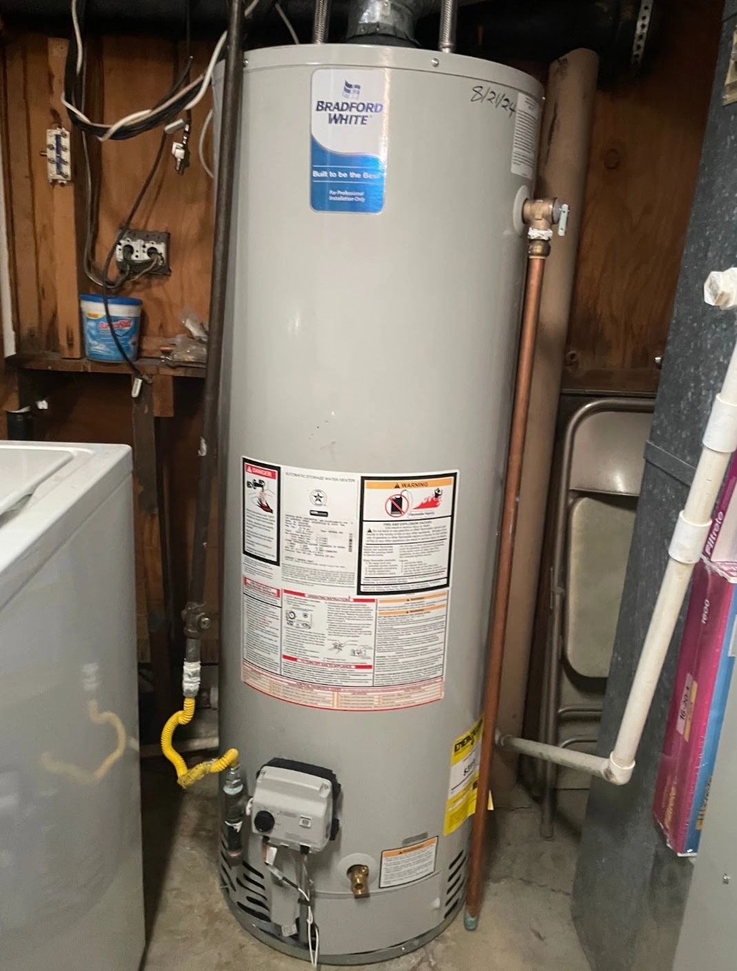 New hot water tank placement