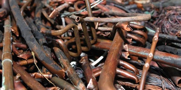 a pile of scrap copper piping