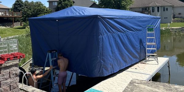 26' long x 84" dropdown Touchless Boat Cover on a 7500lb Capacity Raptor Boat Lift