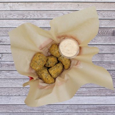 Basket of fried Boudin Balls with dipping sauce.