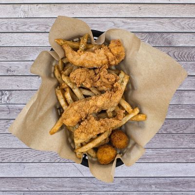 Basket of fried chicken strips, fries, and hush puppies.