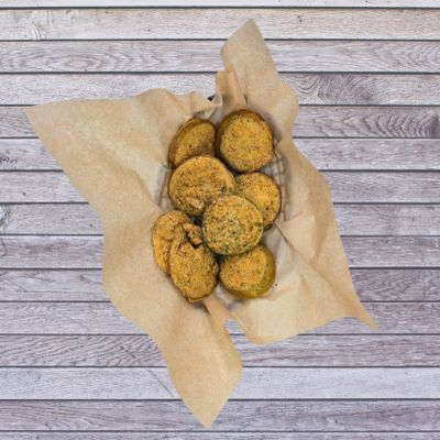 Enjoy our crispy Fried Green Tomatoes, hand-breaded and fried golden brown for the perfect Southern 