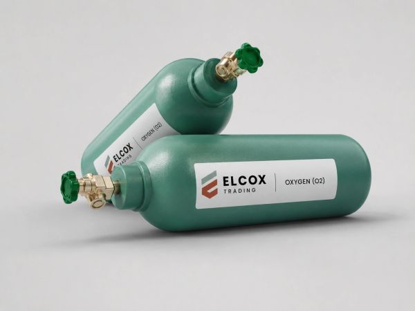 Two green oxygen gas cylinders with valves.