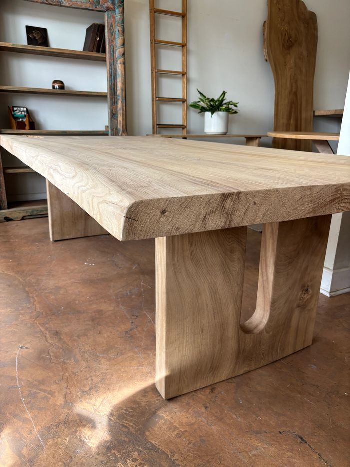 Solid wooden table with clean lines and natural finish.