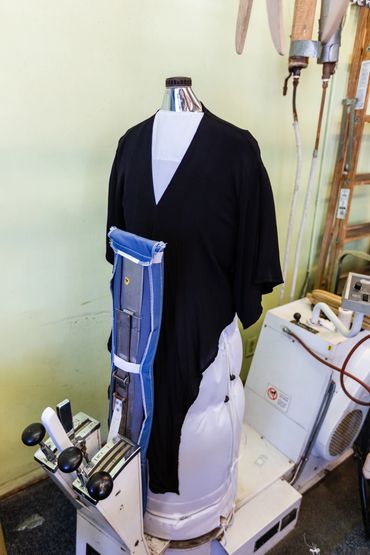 A Mannequin With Clothes On For Steaming