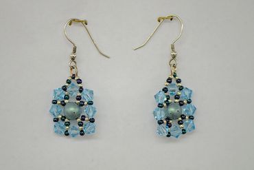 Earrings made with Swarovski crystal and Cab Duos  beads