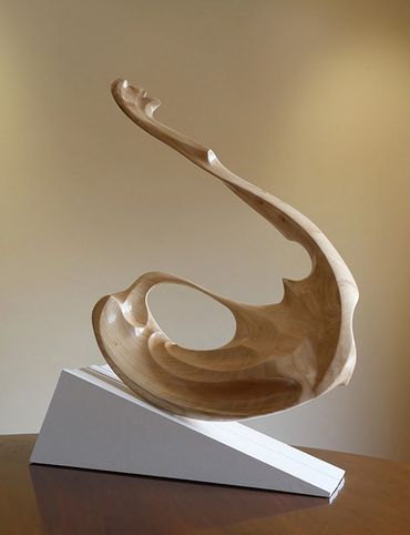 Abstract sculpture from salvaged wood. 
