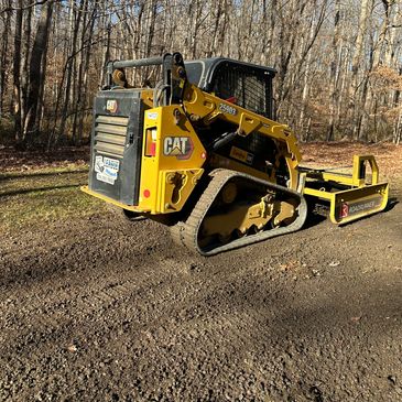 Having the right tools to properly regrade a gravel driveway is the key to a great finished product 