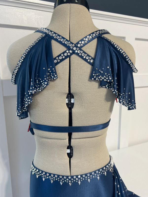 Blue dress back with rhinestone detailing and crisscross straps.
