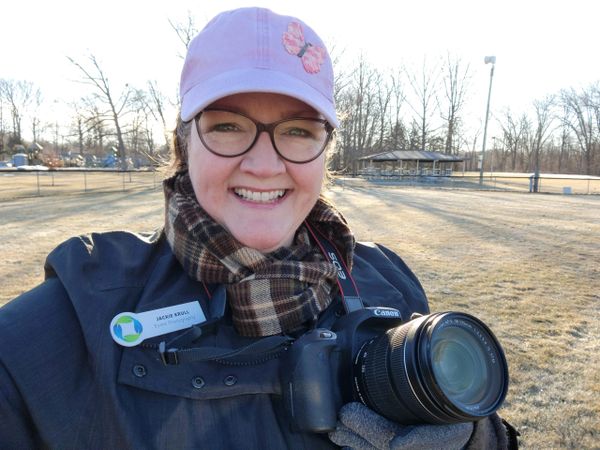Selfie of Jackie Krull holding a camera