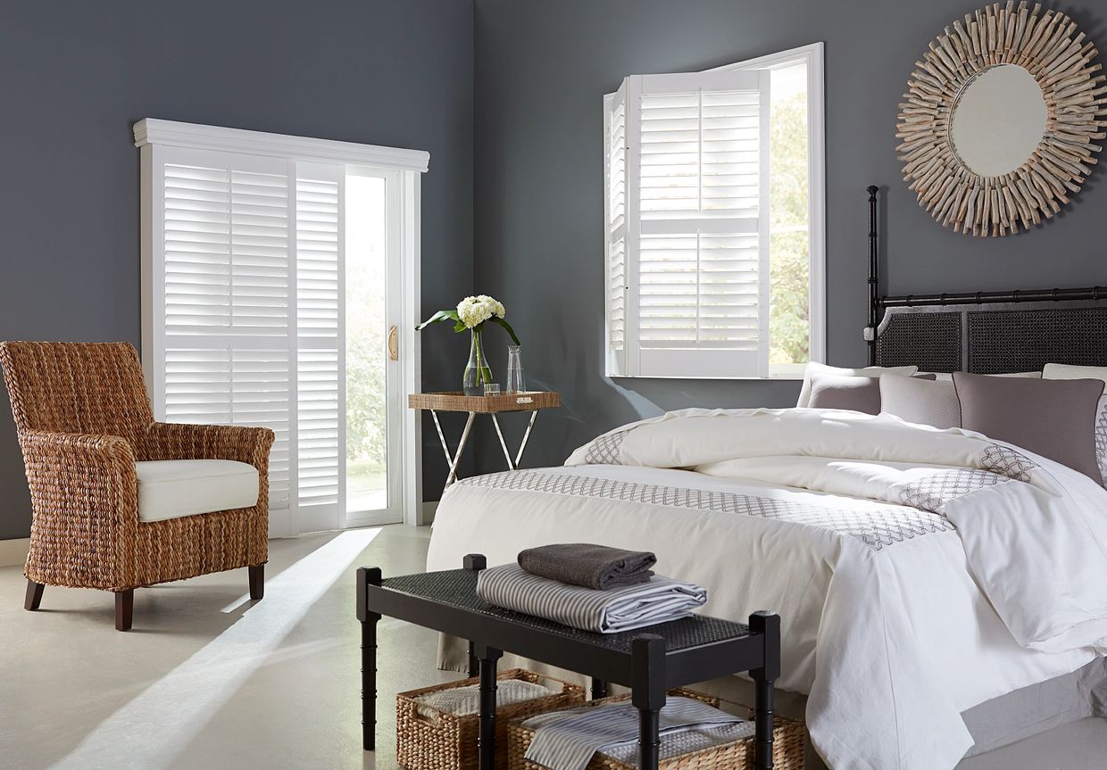 Bi-fold shutters and sliding door shutters in a bedroom for Vancouver and Coquitlam, BC