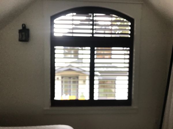 Bathroom Shutter in a house in Vancouver BC to compliment bathroom reno by ShadeZone Blinds.