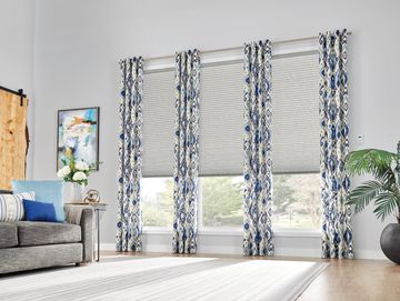 Custom drapery curtains and curtain rod layered with cellular shades for Vancouver and Coquitlam, BC