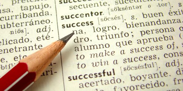 English-Spanish bilingual dictionary entry for "success"