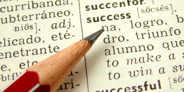 English-Spanish bilingual dictionary entry for "success"
