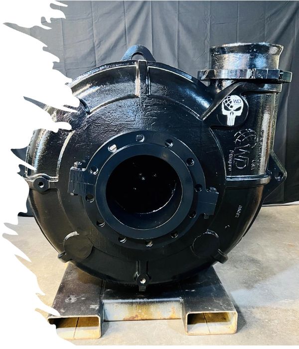Large black industrial pump with inlet and outlet ports on a pallet.