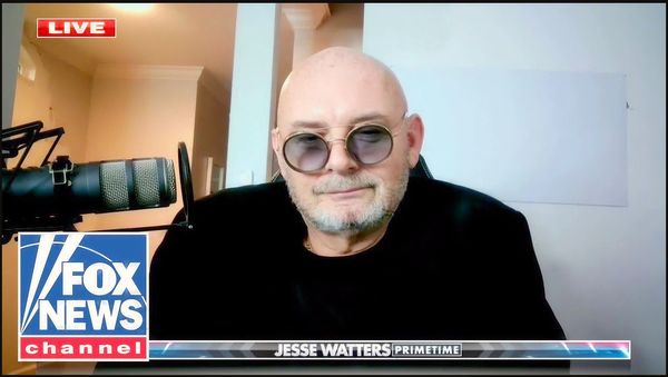 Man with sunglasses speaking live on FOX News primetime.