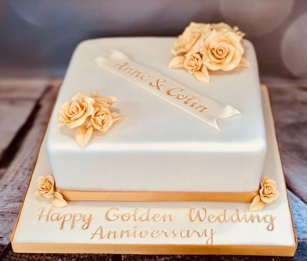Golden wedding anniversary cake - 9" square with handmade gold fondant roses