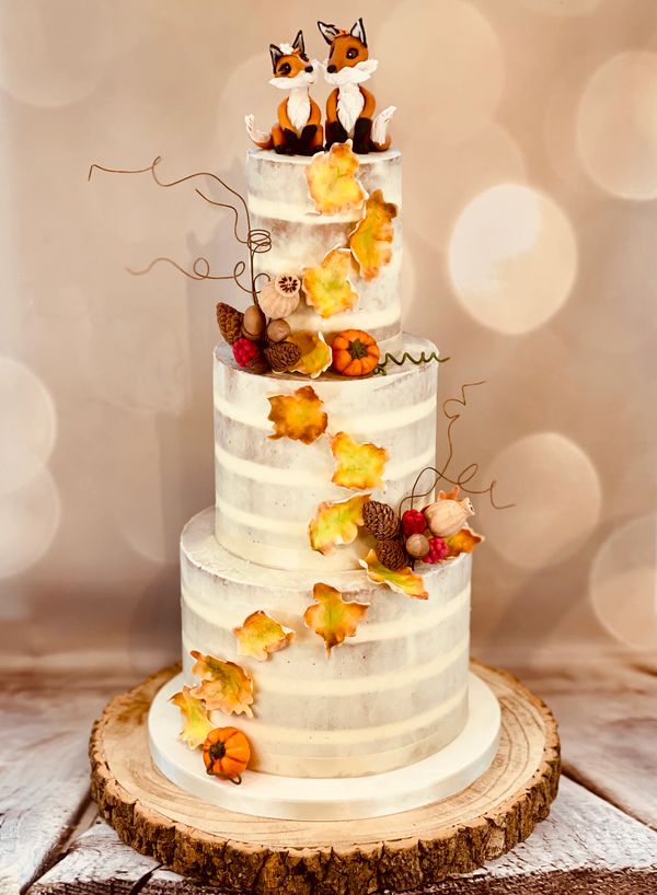 Autumn 3 tier semi naked wedding cake with handmade 'Mr & Mrs Fox' topper