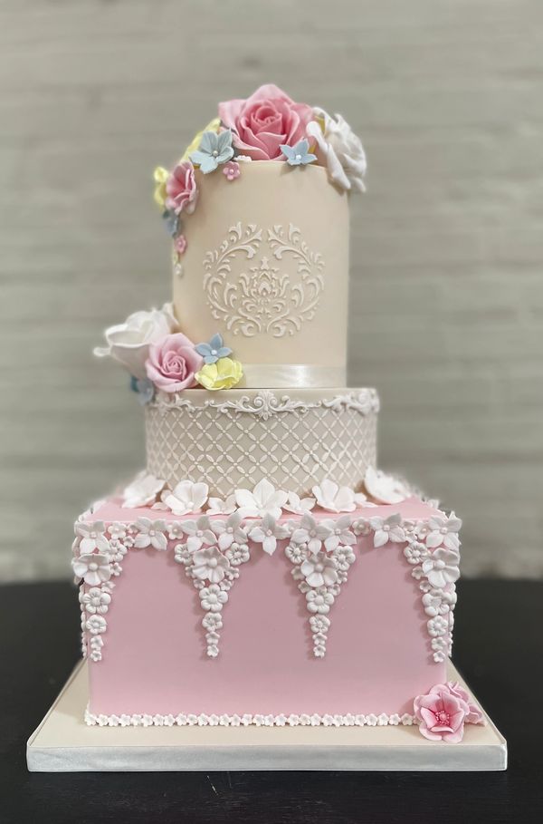Bridgerton themed Wedding cake, 3 tiers , pink and ivory fondant, stencilling and sugar work