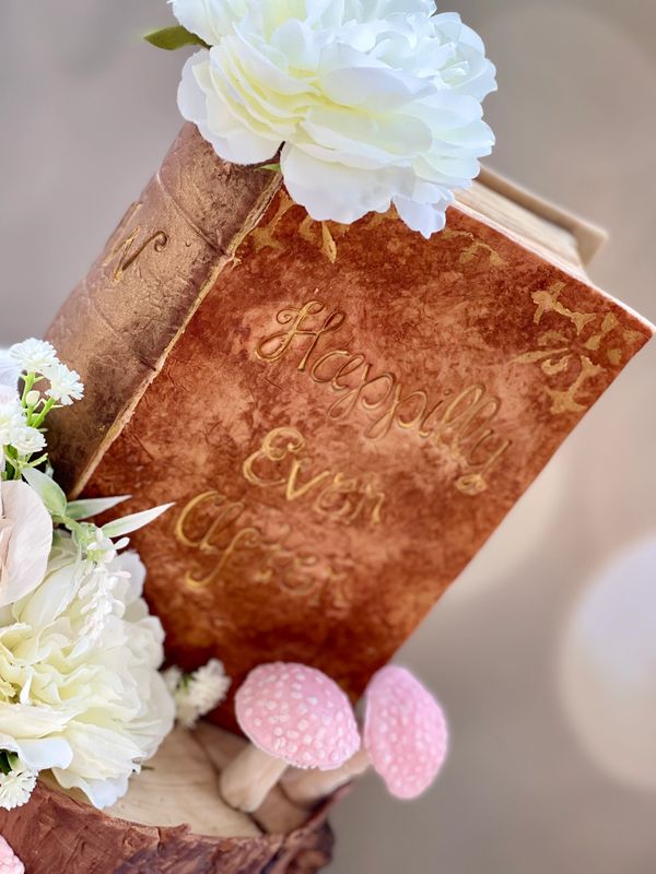 Fairytale book wedding cake topper  'Happily Ever After' on the front in gold