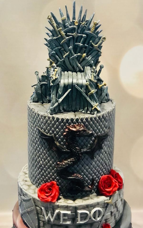 3 Tired Game of Thrones Wedding Cake with handmade Iron Throne topper and red fondant roses