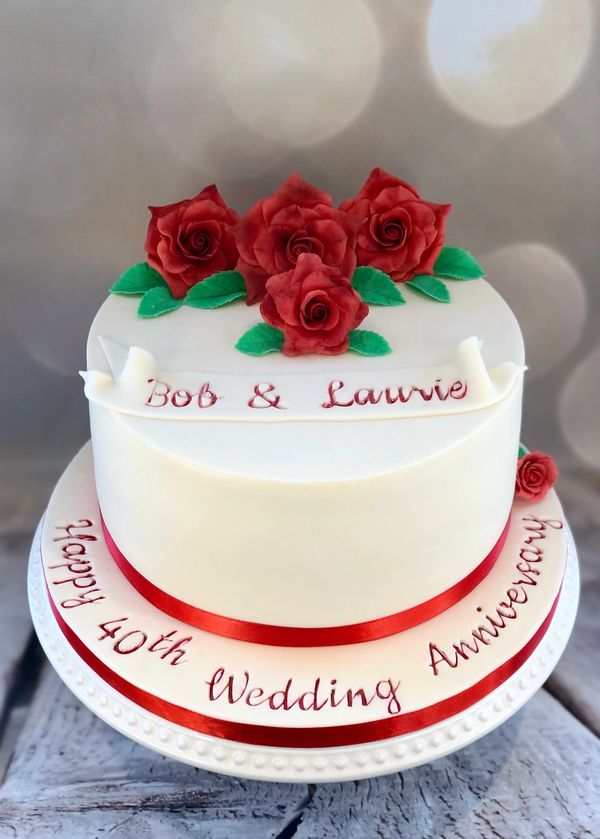 9" Red Velvet Ruby Wedding Cake with ivory fondant and red handmade sugar roses