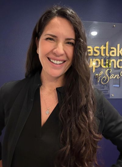 Dr. Nadia Ayadi at Eastlake Acupuncture of San Diego with a warm smile welcomes you to our office