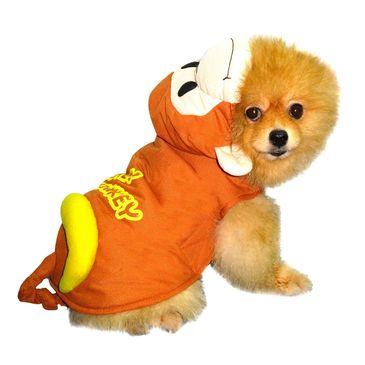 Small dog wearing a cute monkey costume with a tail and hood.