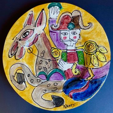 Colorful abstract painting of a person and horse.