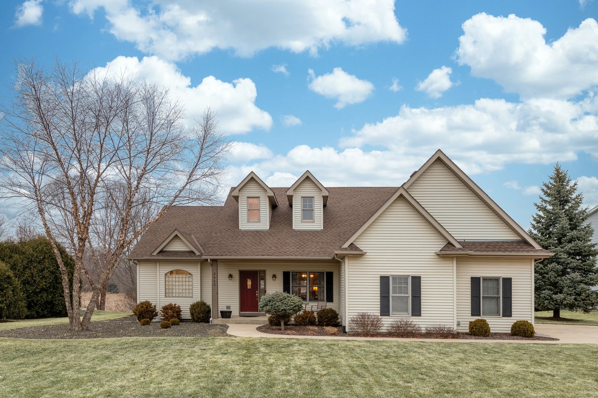 High-quality real estate photography of a modern home exterior captured by a professional real estat