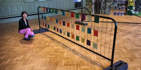 The picture was taken during a group show at the Whitworth Art Gallery for ArtReach, Refugee Week. M