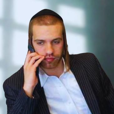 Thoughtful young man in traditional attire talking on a phone.