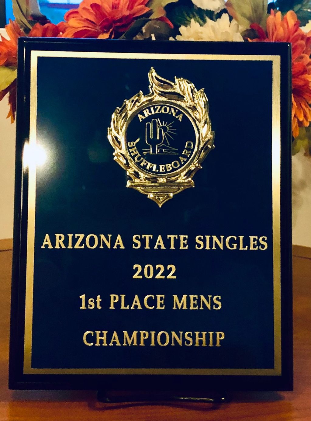 9x12 Black Piano wood plaque with blue brass top plate and matching logo engraved. 
